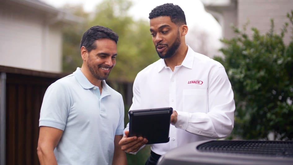 a man holding a laptop